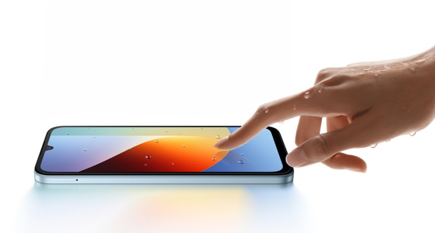 1787651603-redmi-a7-pro-blue-wet-hand.png